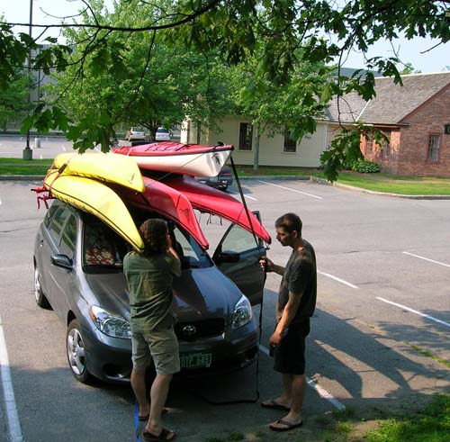 Car loaded up with kayaks